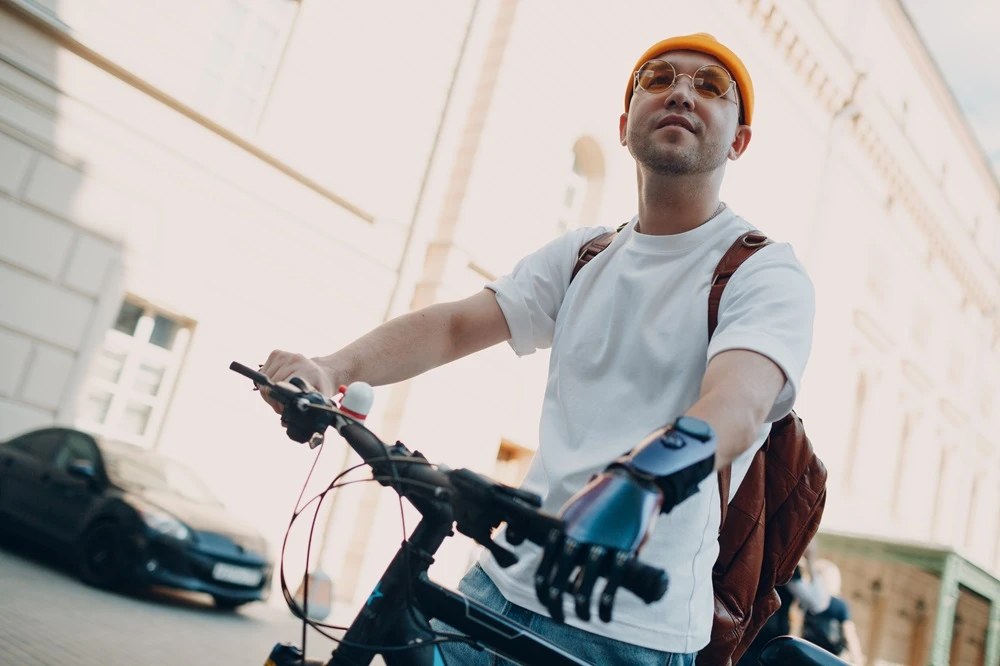 Upper Limb Amputee Cycling Challenges and Solutions
